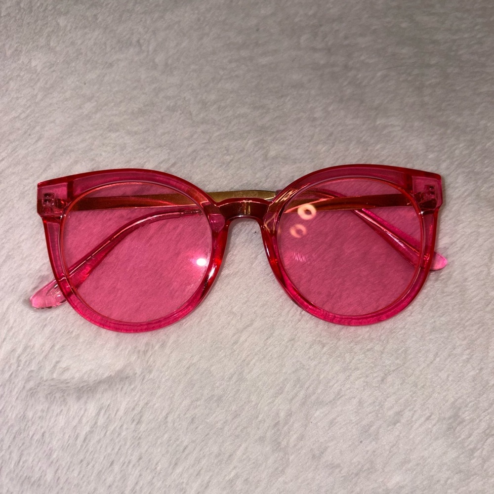 Vibrant Pink Sunglasses with Gold Accents